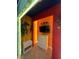 Bright bedroom with colorful walls, a media center, and unique decor at 4306 Lana Ave, Davenport, FL 33897