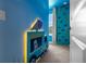 Playful bedroom featuring a climbing wall and custom Minions-themed decor at 4306 Lana Ave, Davenport, FL 33897