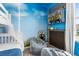 bedroom with bunk beds, beanbag chairs, and Minions-themed decor and a window at 4306 Lana Ave, Davenport, FL 33897