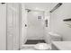 Modern bathroom with marble-tiled shower and hexagon floor at 1040 Texas Ave, Lakeland, FL 33805