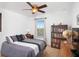 Cozy bedroom with a double bed, built-in shelves, and a large window at 207 Maplebrook Dr, Altamonte Springs, FL 32714