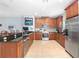 Modern kitchen, featuring ample cabinetry and a large island at 207 Maplebrook Dr, Altamonte Springs, FL 32714