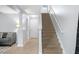 Elegant staircase leading to upper level at 207 Maplebrook Dr, Altamonte Springs, FL 32714