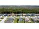 Aerial view of neighborhood with canal and trees at 218 Cattail Way, Lake Alfred, FL 33850