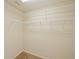 Spacious closet with wire shelving and hanging rods at 218 Cattail Way, Lake Alfred, FL 33850