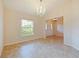 Formal dining room featuring tile floors and chandelier at 218 Cattail Way, Lake Alfred, FL 33850