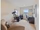 Home office with desk, chair, and chaise lounge at 5128 Caspian St, St Cloud, FL 34771