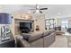Game room with sectional sofa, large TV and a popcorn machine at 5128 Caspian St, St Cloud, FL 34771