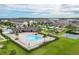 Lakeshore community pool, playground, and basketball court at 5128 Caspian St, St Cloud, FL 34771