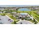Community clubhouse with pool and parking area in front at 5128 Caspian St, St Cloud, FL 34771