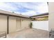 Cozy patio with seating area and adjacent storage at 5128 Caspian St, St Cloud, FL 34771