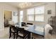Elegant dining room with table, chairs, and a chandelier at 5128 Caspian St, St Cloud, FL 34771