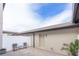 Small patio with seating and a white fence for privacy at 5128 Caspian St, St Cloud, FL 34771