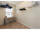 Walk-in closet with shelves, rods and a built-in desk at 5128 Caspian St, St Cloud, FL 34771