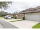 Attached garage with parking for two cars at 5128 Caspian St, St Cloud, FL 34771