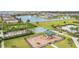 Aerial view of community amenities including playground, pool, and basketball court at 5128 Caspian St, St Cloud, FL 34771