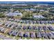 Aerial view of a new residential development with solar panels at 911 Avenal, Davenport, FL 33837