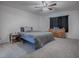 Primary bedroom with dresser and ceiling fan at 911 Avenal, Davenport, FL 33837