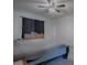 Large Primary bedroom with a king-size bed and grey bedding at 911 Avenal, Davenport, FL 33837