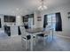 Open concept dining room with kitchen view at 911 Avenal, Davenport, FL 33837