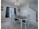 Bright dining room featuring a table with four chairs at 911 Avenal, Davenport, FL 33837