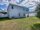 Two-story house with fenced backyard at 911 Avenal, Davenport, FL 33837