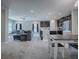 Spacious living room with open floor plan to kitchen and dining area at 911 Avenal, Davenport, FL 33837