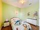 bedroom with a fun jungle theme and plenty of storage at 941 Rimini Dr, St Cloud, FL 34771