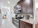Well-equipped kitchen featuring stainless steel appliances at 941 Rimini Dr, St Cloud, FL 34771
