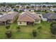 Aerial view of house with solar panels at 941 Rimini Dr, St Cloud, FL 34771
