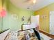 bedroom with fun decor and two twin beds at 941 Rimini Dr, St Cloud, FL 34771