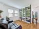 Home library boasts built-in shelving and a comfortable seating area at 941 Rimini Dr, St Cloud, FL 34771