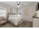 Bright bedroom with a comfortable bed and built-in shelving at 10159 Royal Island Ct, Orlando, FL 32836