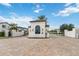 Gated community entrance with guard house at 10159 Royal Island Ct, Orlando, FL 32836