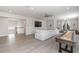 Game room with shuffleboard, comfortable seating, and a large TV at 10159 Royal Island Ct, Orlando, FL 32836