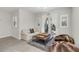 Relaxing sitting area with comfy seating and access to balcony at 10159 Royal Island Ct, Orlando, FL 32836