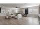 Game room with comfortable seating and shuffleboard table at 10159 Royal Island Ct, Orlando, FL 32836
