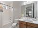 Clean bathroom with shower/tub combo and updated vanity at 10159 Royal Island Ct, Orlando, FL 32836