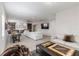 Spacious game room with shuffleboard and multiple seating areas at 10159 Royal Island Ct, Orlando, FL 32836