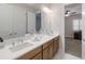 Double vanity bathroom with plenty of counter space at 10159 Royal Island Ct, Orlando, FL 32836