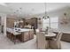 Island kitchen with seating and a breakfast nook at 10159 Royal Island Ct, Orlando, FL 32836