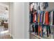 Organized closet with hanging rods and shelving at 10159 Royal Island Ct, Orlando, FL 32836