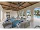 Relaxing community lounge area with pool view at 10159 Royal Island Ct, Orlando, FL 32836