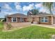 Single-story home with stone accents and a two-car garage at 11447 Sw 69Th Cir, Ocala, FL 34476