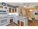 Kitchen with breakfast nook and white appliances at 11447 Sw 69Th Cir, Ocala, FL 34476