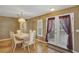 Bright dining room with french doors leading to backyard at 11447 Sw 69Th Cir, Ocala, FL 34476