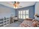 Serene bedroom with twin bed and window seat at 11447 Sw 69Th Cir, Ocala, FL 34476