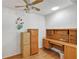 Spacious home office with wood desk and cabinets at 11447 Sw 69Th Cir, Ocala, FL 34476