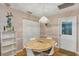 Cozy dining area with round table and white chairs at 11447 Sw 69Th Cir, Ocala, FL 34476