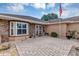 Front entry and patio area of a single-story home at 11447 Sw 69Th Cir, Ocala, FL 34476